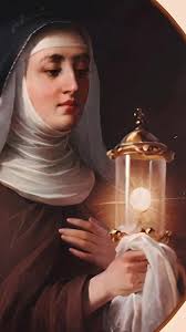 Welcoming a new "member" of our monastery: a donated statue of St. Clare  for our back garden. We are grateful to the donor and to the crew that  transported and set it