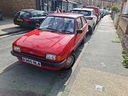 Image result for Bright Red 1980 Fiesta