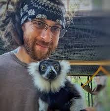 Hand feeding a big wc Crocodile Monitor (Varanus salvadorii) with complete  safety for us for 15 years now. Not even a single tooth touch her hand as  Bill understands how dangerous his