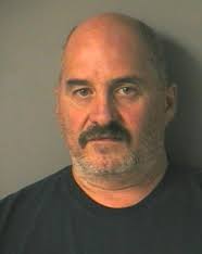 Merrimack man turns himself in to face criminal threatening charge