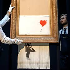 Banksy shared a clip in which he claims to have hidden the paper shredder in the frame years ago and this was his plan all along. Banksy Video Shows Plan To Shred Entire Girl With Balloon Artwork Banksy The Guardian