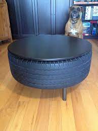 Position the legs in different areas of the tire bottom to see which placement has the best balance. Recycled Tire Coffee Table Automotive Shops Coffee Table Tire Furniture