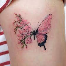 Magnolia sleeve tattoo with a butterfly. Butterflytattoos Disneytattoos Dragontattoos Fingertattoos Mandalatattoos Na Butterfly With Flowers Tattoo Colorful Butterfly Tattoo Beauty Tattoos