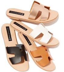 The parisian brand has offered a variety of designs in sleek and elegant styles such as oran and izmir, while all styles have been very popular. Copycat Versions Of Hermes Oran Sandals Are Everywhere So Why Isn T The Brand Suing The Fashion Law