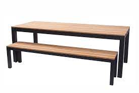 The frame structure of the rustic table showing the reclaimed wood gutters attached to the porch posts. Reclaimed Garden Dining Table Anthracite Bau Outdoors