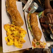 كاريبيان ساندوتش Caribbean Restaurant In الشاطئ
