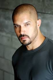 Robert Christopher Riley '98 is a film, TV, and stage actor of Trinidadian  and Bajan descent. He's known for his role as Terrence Wall in the VH1  drama series Hit The Floor (