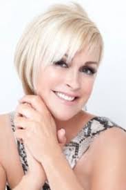 Book or Hire country music singer LORRIE MORGAN 888-655-4575