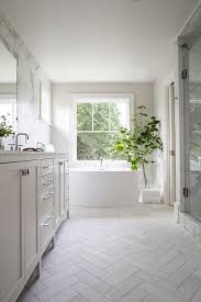 Welcoming White Bathroom Is Fitted With Honed White Marble Herringbone Floor Tile Modern Kitchen Tile Floor Modern Kitchen Flooring Kitchen Floor Tile Patterns