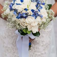 Throw a few stems together and wrap a ribbon around 'em, right? Blue And White Diy Wedding Flowers Real Wedding