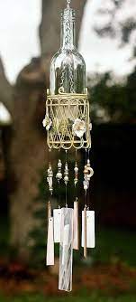 40 Diy Wind Chime Ideas To Try This Summer Bored Art Wine Bottle Wind Chimes Wind Chimes Diy Wind Chimes