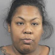 Murder suspect's ex-wife accused of helping him hide after Gretna bar  shooting