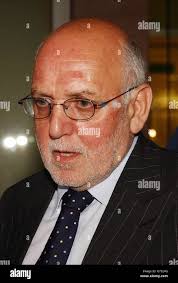 Geoff Thompson, Chairman of the Football Association, leaves his office in  central London. The FA Chairman has been locked in meetings after the  resignation of chief executive Mark Palios and the uncertainty