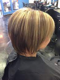 Short Layered Bob Haircut With Dark Caramel Blonde Low Lights And High Lights Short Layered Bob Haircuts Layered Bob Haircuts Caramel Blonde