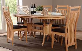 Habitat clifton wood extending dining table & 6 oak chairs. Townhouse Bali Extending Oak Dining Table And 4 6 Chairs Set Brown In Home Furniture Diy Furnit Oval Table Dining Wooden Dining Room Table Dining Table