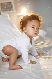 These feminine ideals of beauty have been criticized as restrictive, unhealthy, and even racist. Cute Baby With Fluffy Hair Pretty Boy Stock Photo Picture And Royalty Free Image Image 138066681