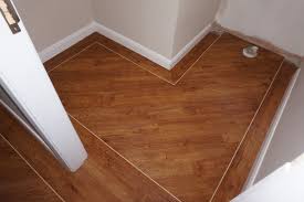 Polyflor Lvt Design Vinyl Tile Flooring Wood Plank Camaro Circle Feature Mitre Boarder Ideas Fitted By Paul Ho Vinyl Tile Flooring Flooring Living Room Kitchen
