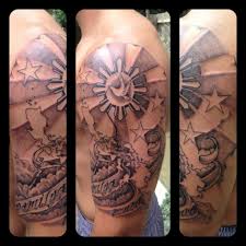 Filipino tribal tattoo on right half sleeve. Filipino Sun And Stars Tribal Tattoo Novocom Top