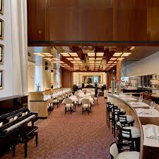 restaurants paris hotel plaza athenee dorchester collection hotel brasserie parisienne interieur art deco