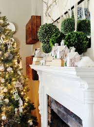 Boxwood And Glitter Houses Layered On Mantle For Christmas Christmas Mantel Decorations Diy Christmas Mantel Christmas Mantels