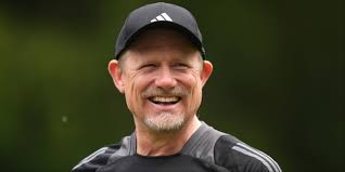 Wigan fan hilariously warms up in the stands after goalkeeper goes down  injured