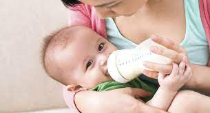 How to switch your baby from bottle to cup. Introducing Your Breastfed Baby To The Bottle Or Cup Babycenter