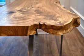The wood's natural graining provides texture and character, while the live edge boasts rustic charm. Diy Live Edge Floating Shelves The Handyman S Daughter