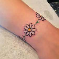 Set of 2 floral lotus flower temporary tattoo vintage fake waterproof boho small wrist tattoo custom bachelorette tattoos. 61 Small Daisy Tattoos Ideas With Meaning Daisy Chain Tattoo Anklet Tattoos Daisy Tattoo