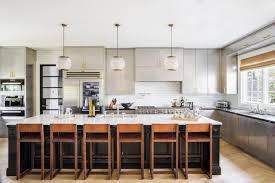 When it comes to kitchen cabinets, most of us crave custom design. 20 Polished Kitchens With Striking Black Kitchen Islands Dark Kitchen Island Trend
