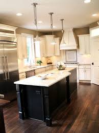 White Kitchen Cabinets Black Island White Countertops Dark Wood Floors Wood Floor Kitchen Contemporary Kitchen Home Kitchens
