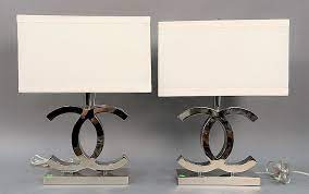 Pair Of Chanel Table Lamps Stainless Steel With Large Cc Design Coco Chanel Ht 25in Sold At Auction On 9th June Bidsquare