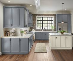 Of course, depending on what shade of grey you choose, your kitchen could be closer to one end or the Painted Serious Gray And Truecolor Glacier Kitchen Cabinets