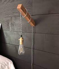 Make A Simple Wooden Diy Wall Light For 25 Wall Lights Diy Plug In Wall Sconce Modern Industrial Decor