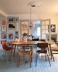 Dining Room Style Inspiration Gallery Wall Ideas Mismatched Chairs And French Doors Eclectic Dining Room Dining Room Style Dining Room Style Inspiration