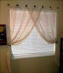 Repeat until you're to the opposite end. Life Unexpected How To Hang A Curtain Without A Rod Ways To Hang Curtains Unique Ways To Hang Curtains Curtains