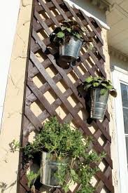 Lattice Planter Use For My Herbs Ivy Flowers On The Privacy Fence Next To Grill On Pallet Apartment Patio Gardens Hanging Flower Pots Apartment Patio