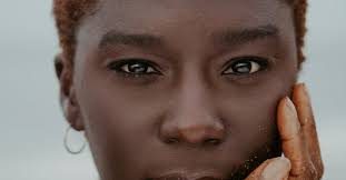 Hand touching unemotional black woman in traditional neck rings · Free  Stock Photo