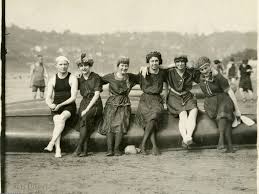 Think warm thoughts. View of six swimmers, sitting