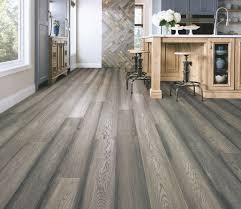 Love The Luxe Look Of Hardwood Floors In A Kitchen But Fear It Won T Stand Up To The High Foot Traffic And Multipl In 2020 Waterproof Hardwood Hardwood Wooden Flooring