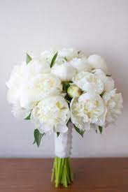Peonies, roses, tulips, calla lilies, hydrangeas, sweet pea, and ranunculus are just a few of the many flower types readily available for spring weddings. An Elegant Navy And White Wedding Every Last Detail Peony Bouquet Wedding White Wedding Bouquets Peony Wedding