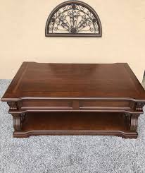 T869 9 Alymere Lift Top Cocktail Table With Scrolled Legs Decorative Hardware And Lift Top In Vintage Brown For Sale In Hamilton Oh Decorative Hardware Vintage Brown Decor