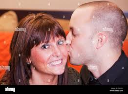 Cheek kisses hi-res stock photography and images