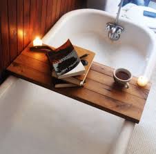 Looking for small bathroom ideas that will make the whole space seem bigger? 15 Bathtub Tray Design Ideas For The Bath Enthusiasts Among Us