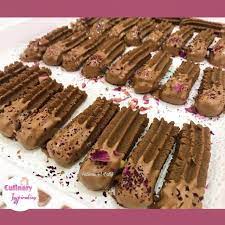 Dairy Milk Fingers Nutella Rounds Recipe By Fatima A Latif Recipe Eid Biscuit Recipes Chocolate Biscuit Recipe Indian Dessert Recipes