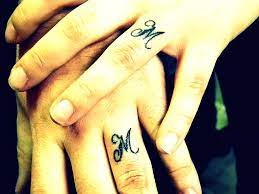 Pin By Mera 101 On Tattoos Tattoo Wedding Rings Wedding Ring Tattoo Ring Tattoos