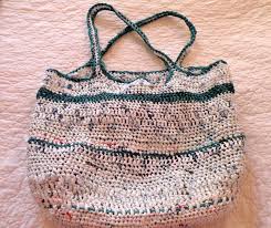 Take your old plastic bags and magazine sleeves, chop them into strips, loop together and start hooking them into something else. Crochet Fun Beach Bags From Recycled Plastic Bags Feltmagnet Crafts
