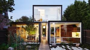 Dilapidated coach house reinvented into small home with loft. Compact Sustainable Homes Sustainable House