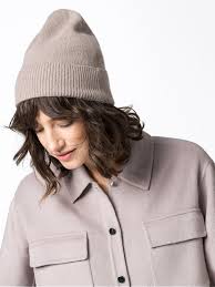 Ranging from sweaters, scarves, and shrugs to hats and mitts, the projects represent both what women want to wear and what they actually have time to knit. Cashmere Hat With A Brim In Beige Hallhuber