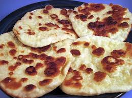 Naan Bread Recipe Breads With Active Dry Yeast Warm Water White Sugar Milk Eggs Salt Bread Flour Minced Garl Naan Bread Recipes Recipes With Naan Bread