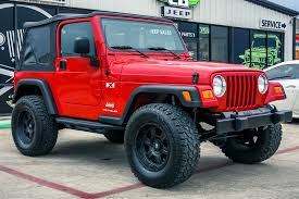 Image result for Flame Red 2006 Jeep